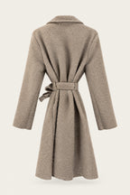 Manteau court bouclé ceinturé