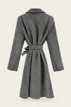 Manteau court bouclé ceinturé